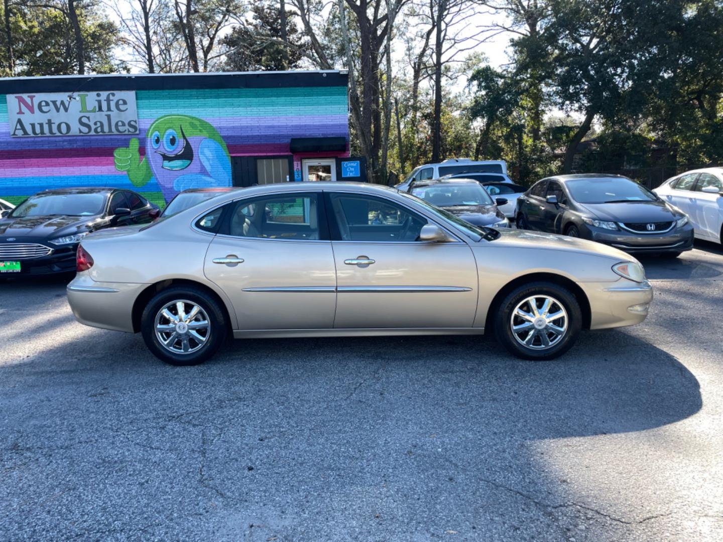 2005 GOLD BUICK LACROSSE CXL (2G4WD562351) with an 3.8L engine, Automatic transmission, located at 5103 Dorchester Rd., Charleston, SC, 29418-5607, (843) 767-1122, 36.245171, -115.228050 - Local Trade-in with Leather, CD/AM/FM, OnStar, Dual Climate Control, Power Everything (windows, locks, seats, mirrors), Keyless Entry, Chrome Wheels. Clean CarFax (no accidents reported!) Only 119k miles! Located at New Life Auto Sales! 2023 WINNER for Post & Courier's Charleston's Choice Pre-owned - Photo#7